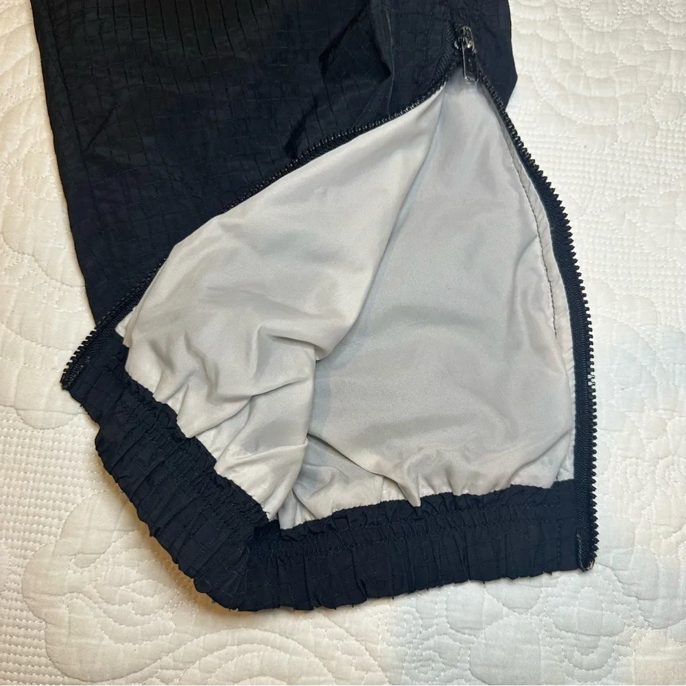 Vintage 1990s Black Tag Nike Challenge Court Track Pants. Black. Size: Large.
